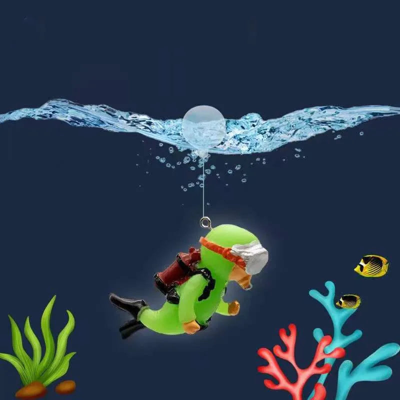 A green resin mini diver ornament is shown underwater with a splash of water.
