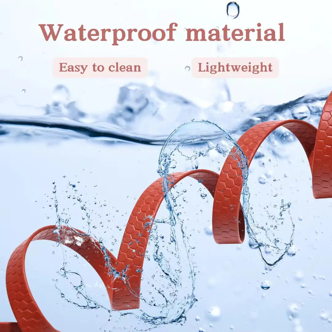 Close-up of an orange waterproof dog leash with a rustproof metal hook being used in water.