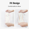 Hands holding a white disposable dog diaper designed for comfort to wear.