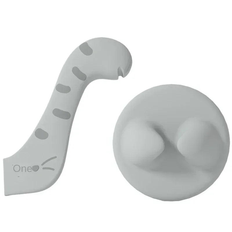 A light gray multifunctional pet feeding spoon with a notched handle and a round sealing lid.