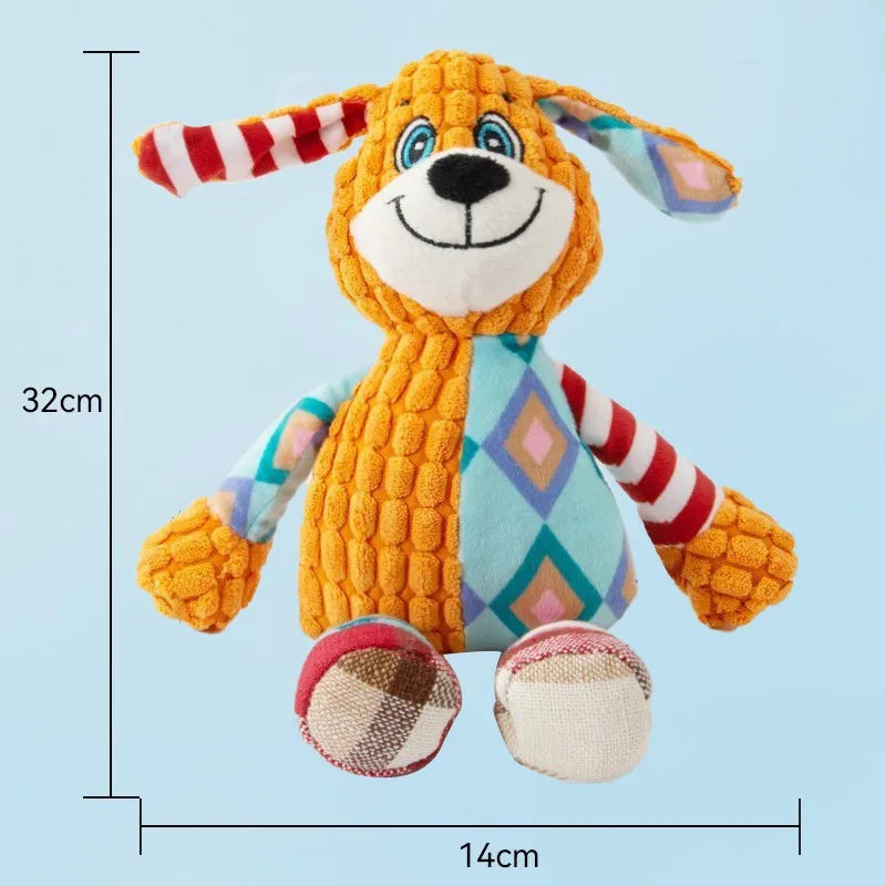 An orange plush dog toy with striped ears and a blue body, featuring fox, elephant, and puppy designs.