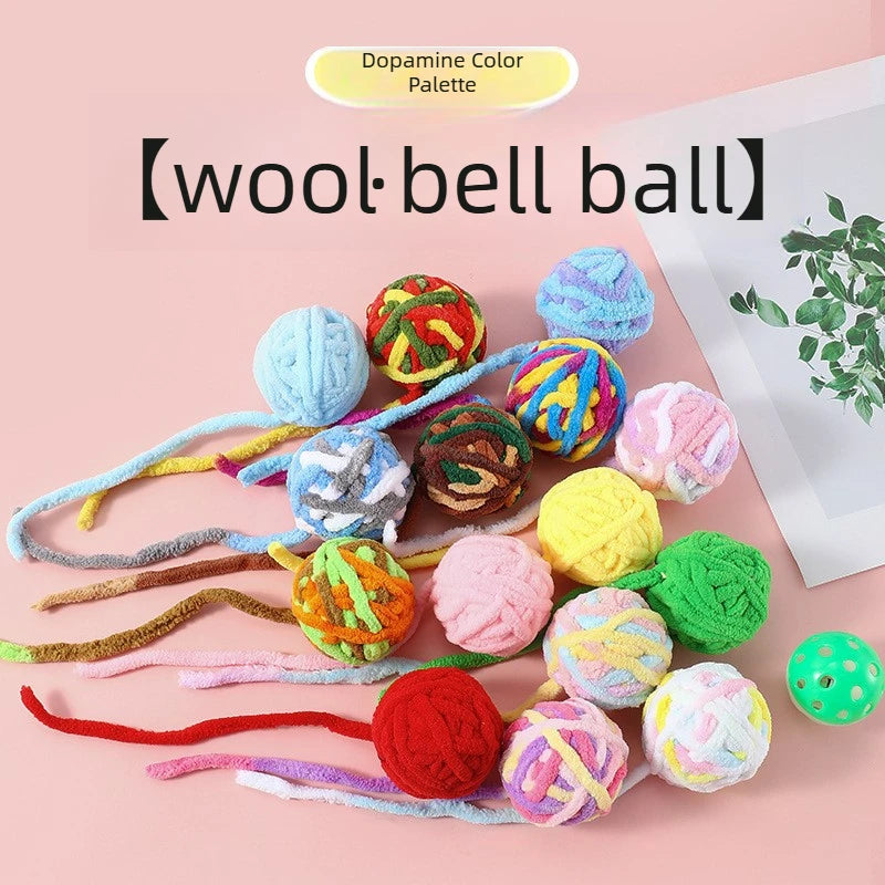 A collection of colorful wool balls and yarn in a dopamine color palette for crafting or toys.