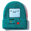 A teal knitted beanie hat featuring a square face design embroidered on the front.