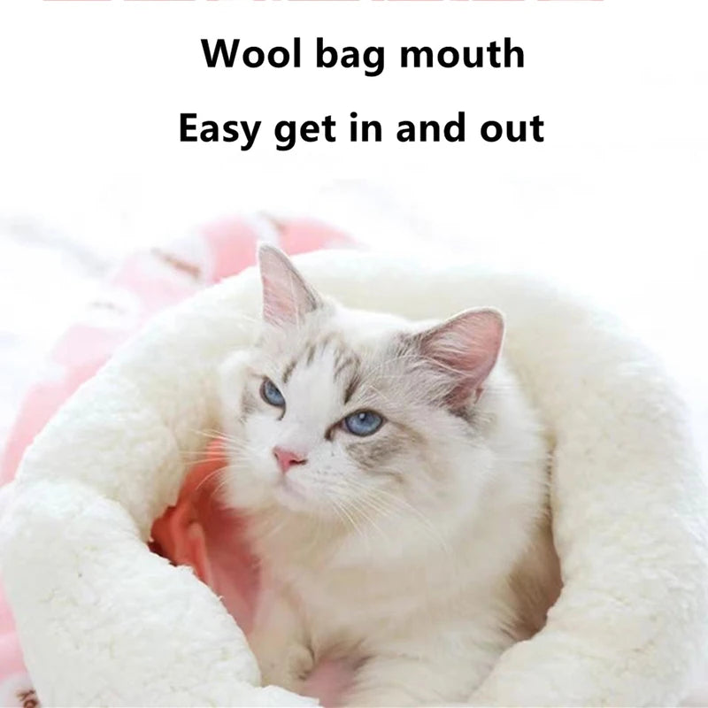 A fluffy white and gray cat is nestled inside a wool bag mouth pet bed.
