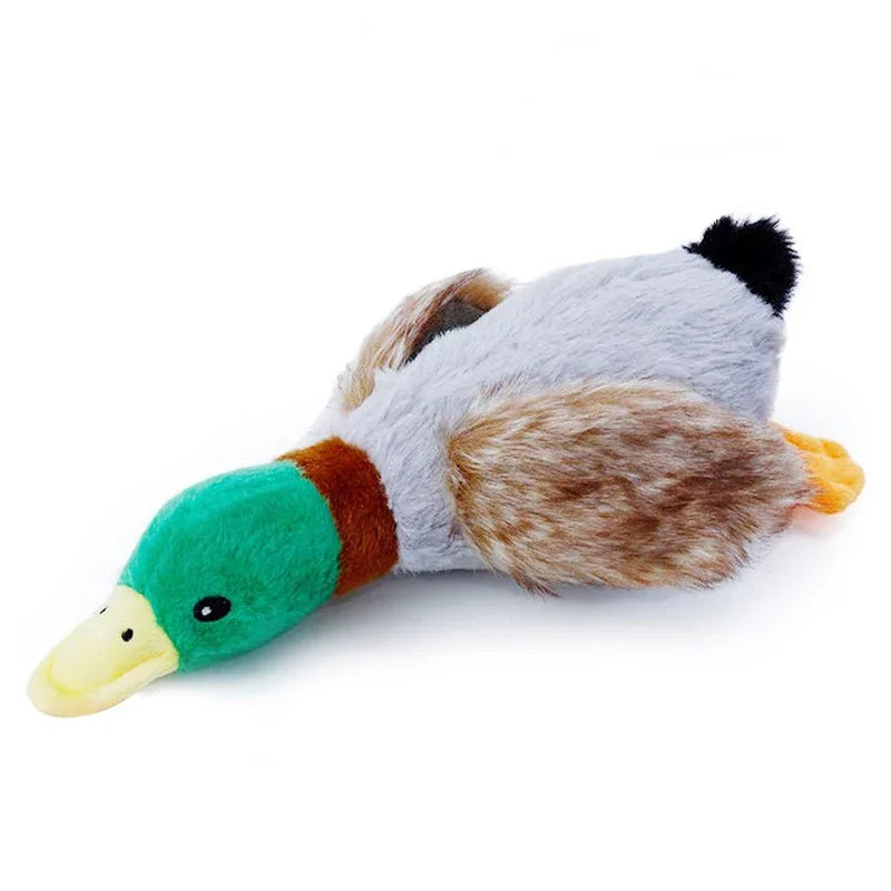 A plush toy of a duck with gray and brown feathers and a yellow beak.