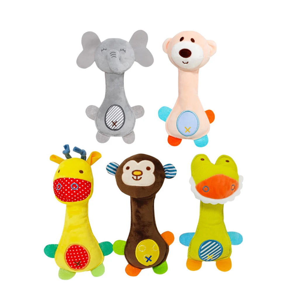 A collection of four plush dog toys in various colors and shapes including a gray elephant, a pink dog, a yellow giraffe, and