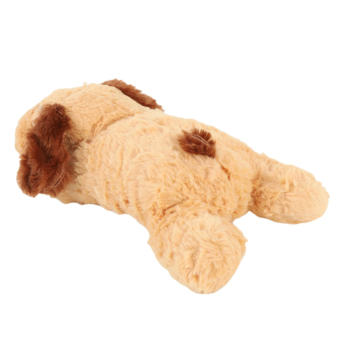 A light tan stuffed animal resembling a dog or cat with brown accents.