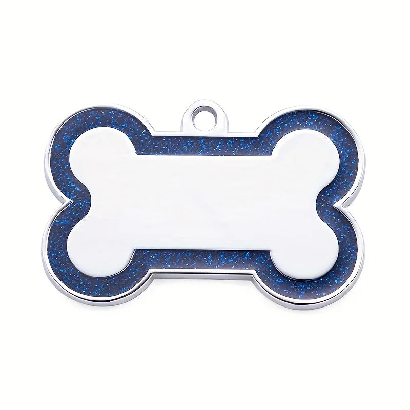 Silver dog bone shaped pet ID tag with blue glitter accents