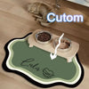 A pet feeding mat with a green surface and a light wood base, featuring a bowl of food.