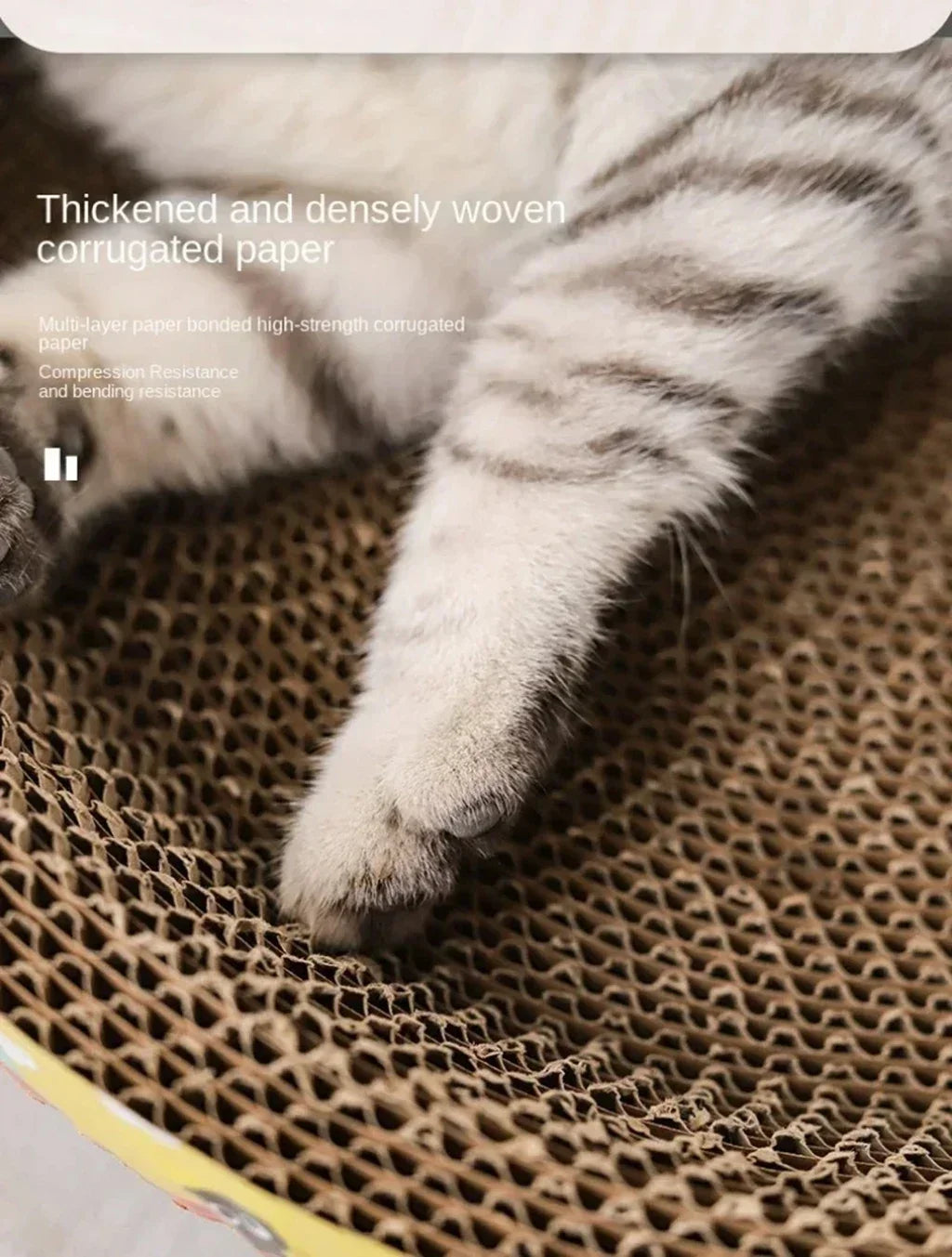 A striped cat paw is visible on a brown, textured scratching post material.