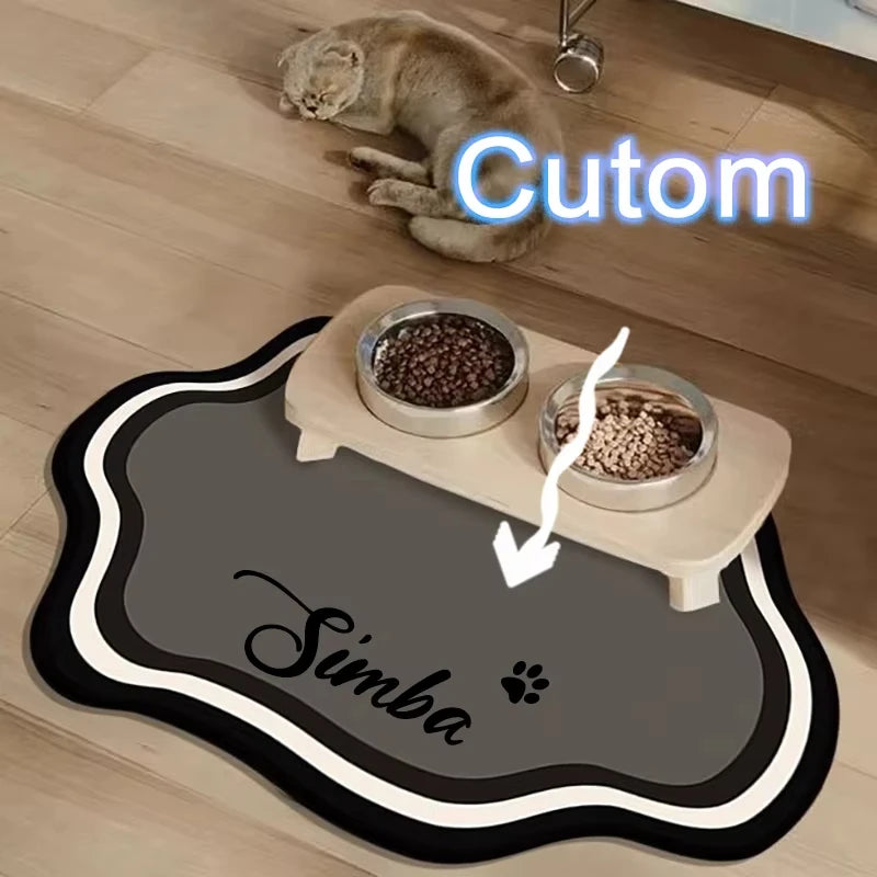 A pet feeding mat with a non-slip base features a bowl of seeds and the name Simba on a gray mat.