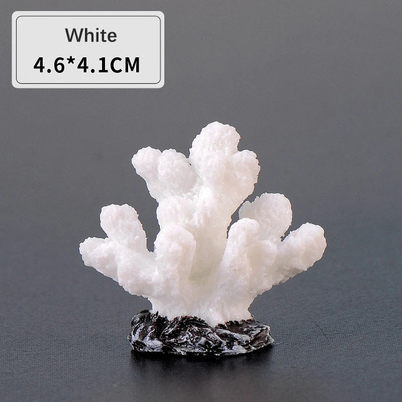 White resin coral decoration measuring 4.6x4.1cm mounted on a dark base
