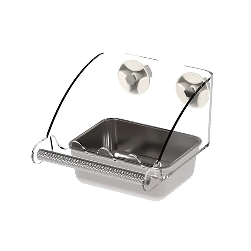 A clear glass pet feeding bowl with a stainless steel insert and a wire mesh strainer.