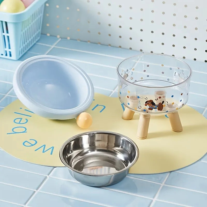 Elevated stainless steel double pet bowl with stand and a separate bowl on a yellow mat