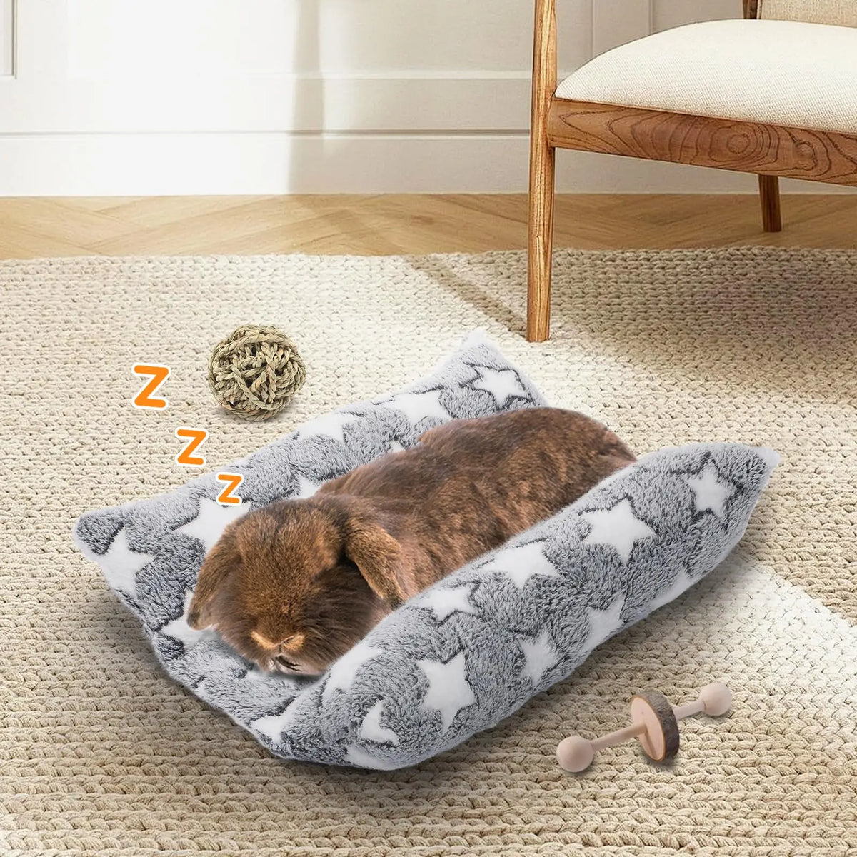 A plush star-pattern rabbit bed with a recliner pillow resting on a beige rug.
