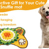 A dog is sitting next to an interactive puppy snuffle mat filled with treats and fabric for foraging