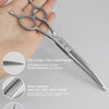 Silver professional pet grooming shears with a flat head and high-density tooth design shown on a hand.