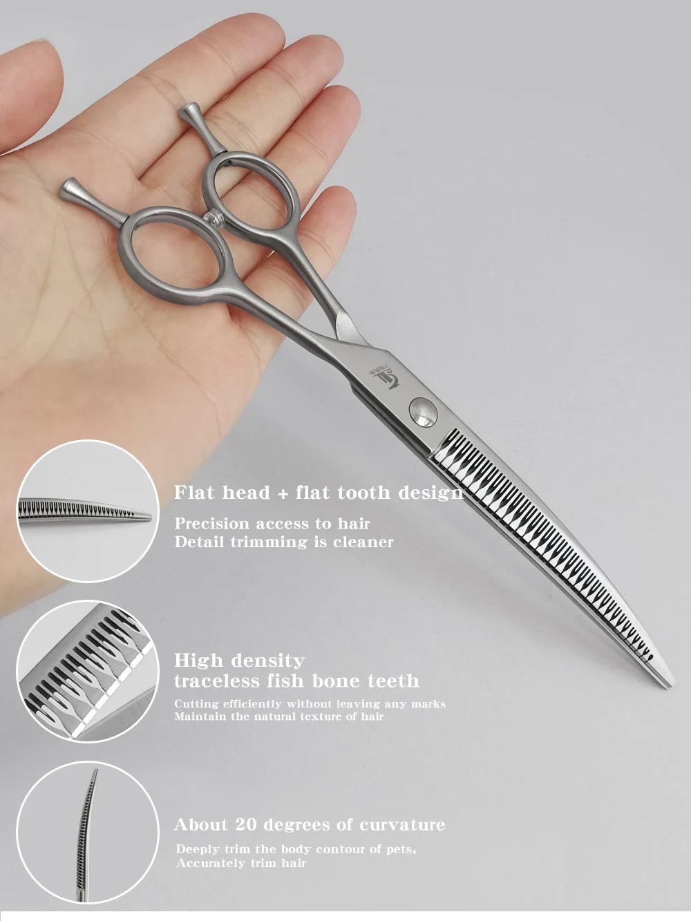 Silver professional pet grooming shears with a flat head and high-density tooth design shown on a hand.