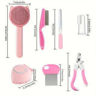 Pinkes Tierpflege-Kit mit Bürste, Kamm, Nagelscherer und Pflegewerkzeug.