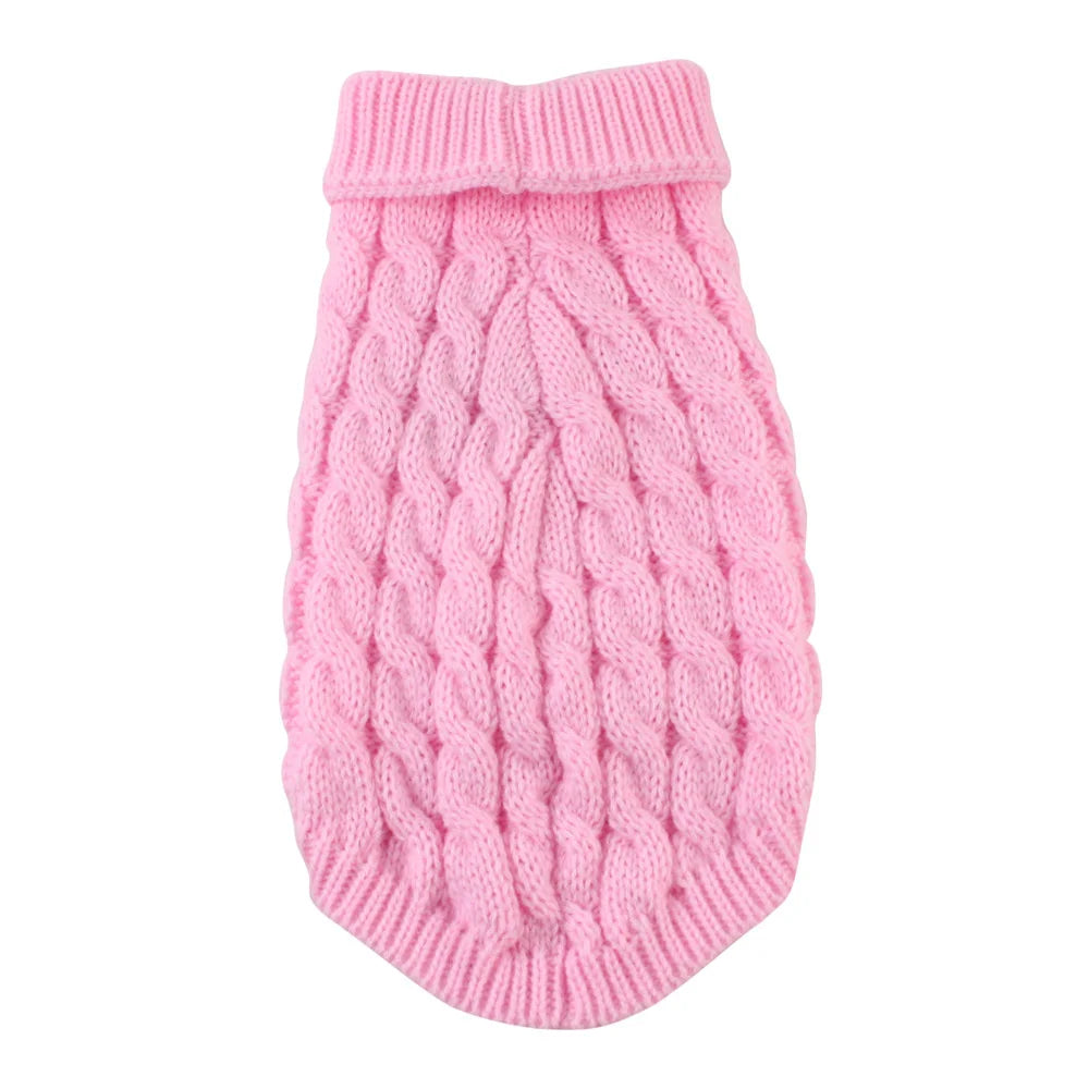 Pull en tricot rose avec col côtelé et corps texturé, ressemblant à un chiot.