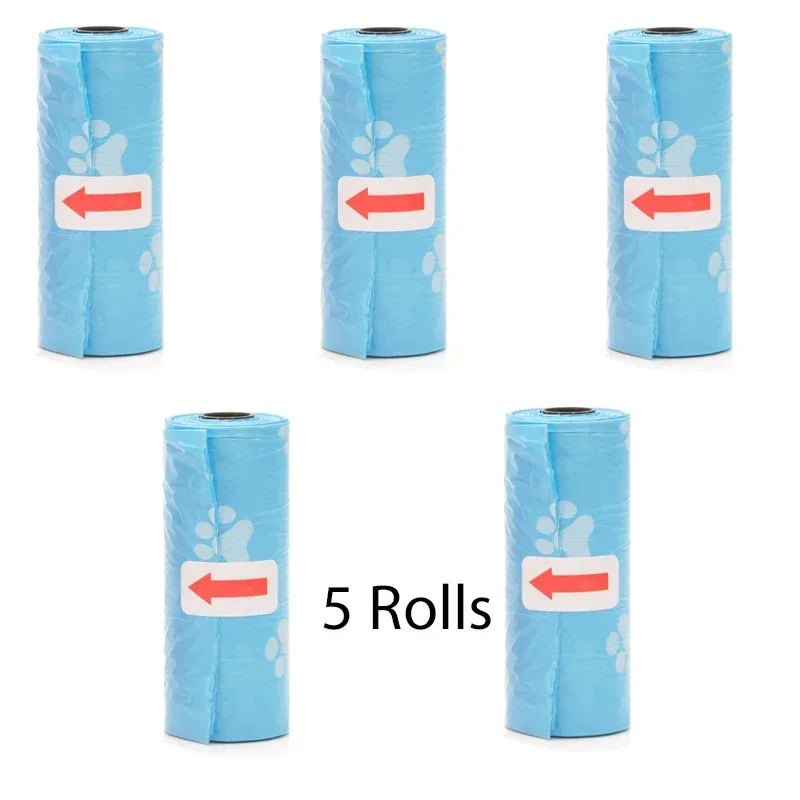 Five rolls of blue reusable pet poop bags with white paw prints and red arrows on the front