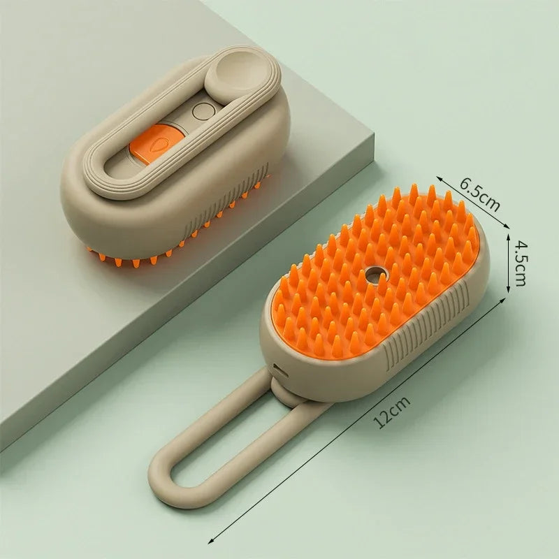 A beige pet grooming brush with an orange bristled head and a handle, shown on a light green surface.