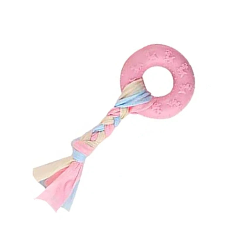 Pink rubber chew toy for small dogs featuring a dental cleaning texture and braided cord.