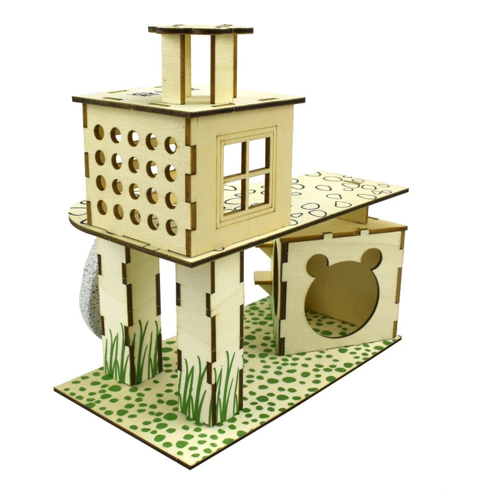 A wooden hamster playground set featuring a house structure, platform, and nest built from light wood planks.