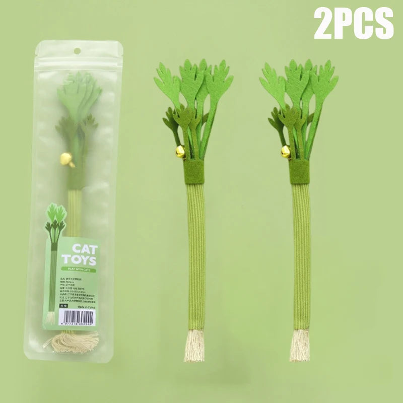 Two green cat toys shaped like celery stalks with bells for dental care and play