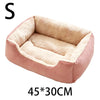 A pink plush pet bed with a soft, fuzzy lining and anti-slip base is shown.