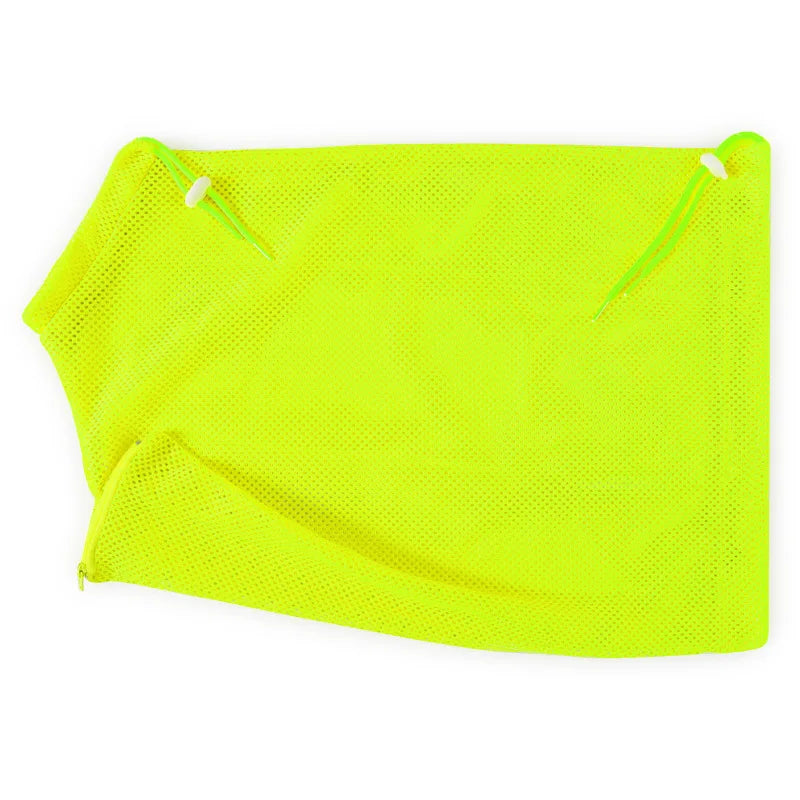 Bright yellow mesh grooming bag with green drawstrings for pet bathing and trimming