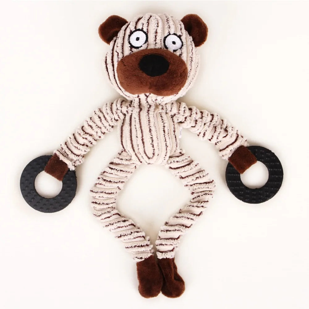 A plush toy resembling a bear with brown fur and white stripes, featuring large eyes and dark nose.