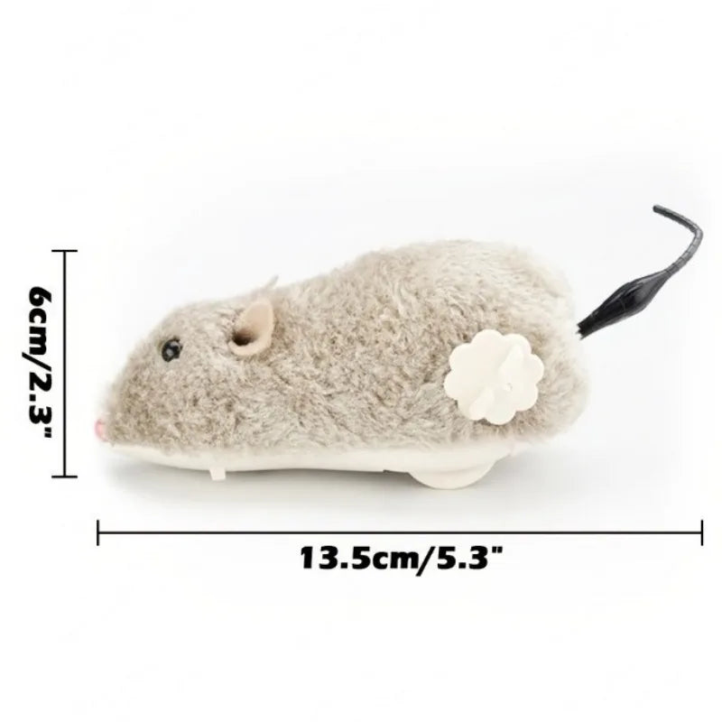 A light gray plush mouse toy with black ears and a thin tail, shown with dimension markings.