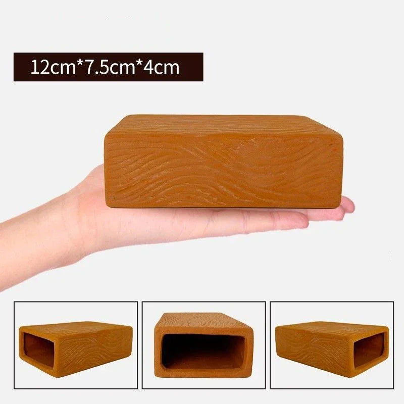 A wooden ceramic aquarium breeding cave and shrimp shelter shown in various views and held in a hand.