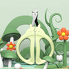 A light green cat-shaped nail clipper with a safety guard is shown surrounded by green plants and mushrooms.