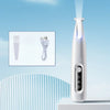 A white portable dog grooming trimmer with an LED light is shown standing upright against a light blue background.