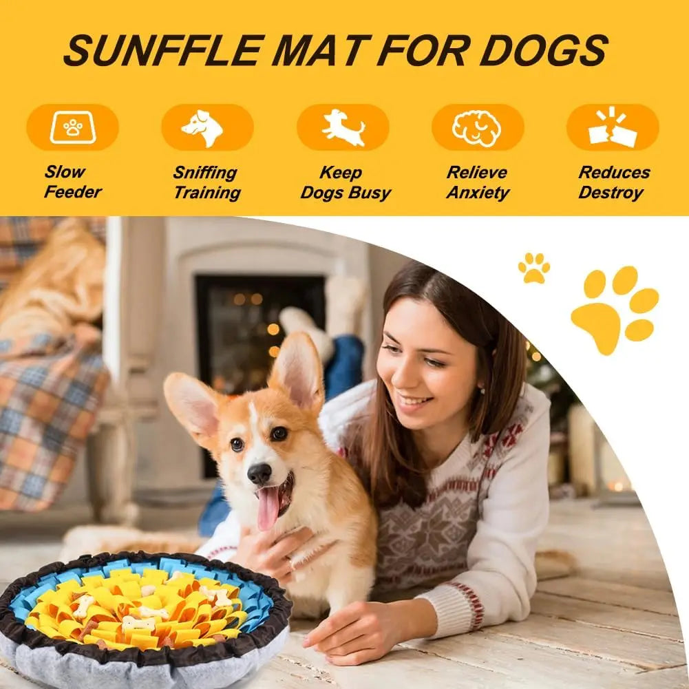 A woman feeds a dog from a colorful snuffle mat, showing the interactive nosework feeding product in use.