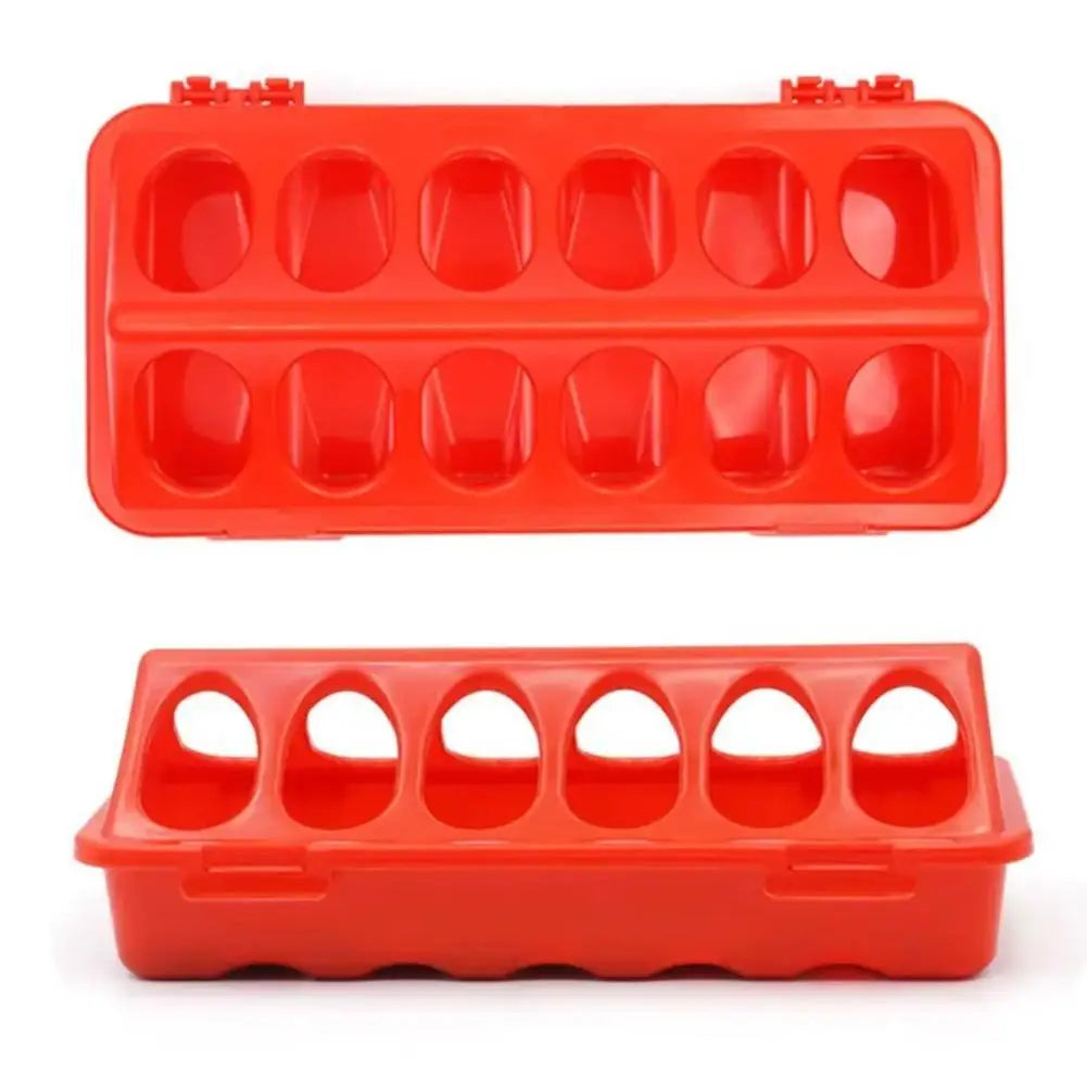 Red double-sided 12-hole poultry feeder for quail, chicks, and small birds.