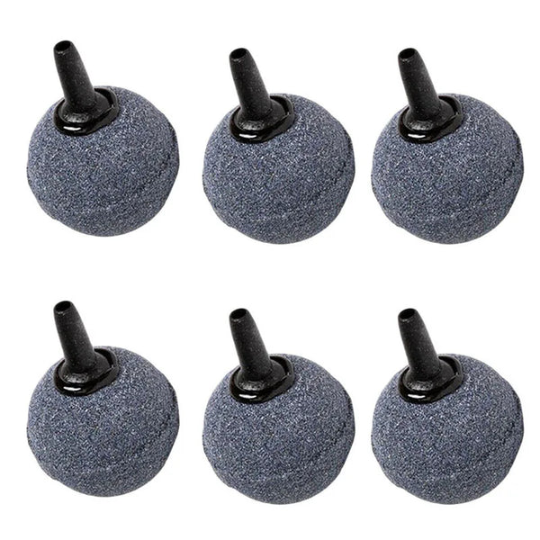 A set of four gray aquarium air stone diffusers with black nozzles.
