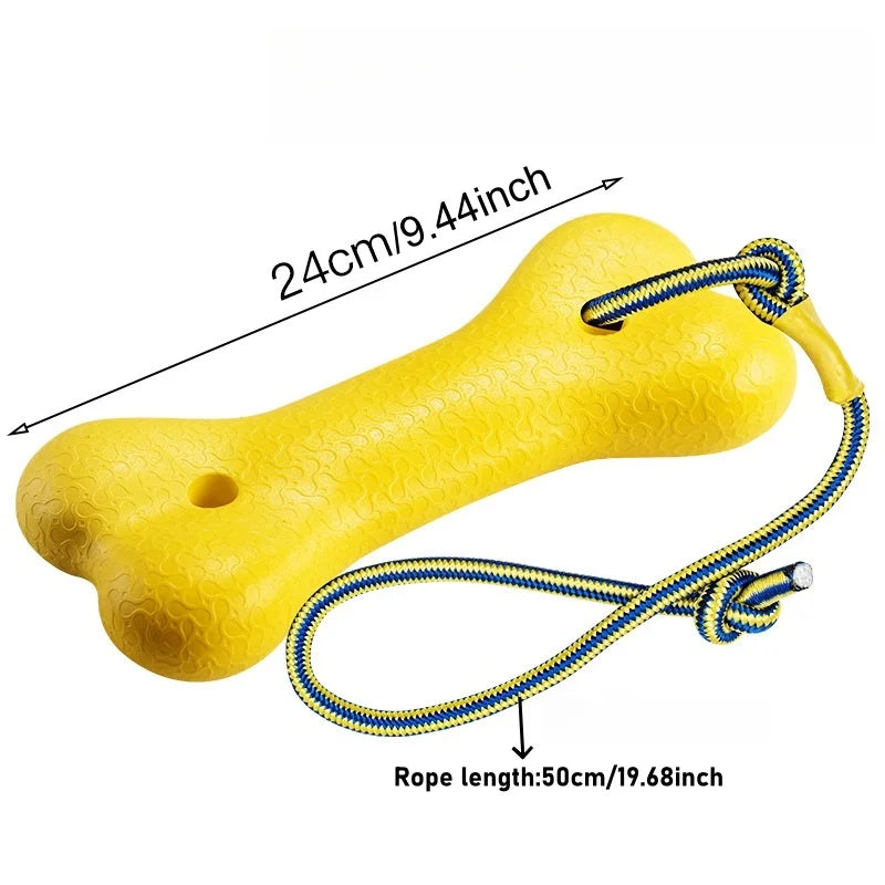 Yellow floating dog fetch toy with a rope, measuring 24cm long.