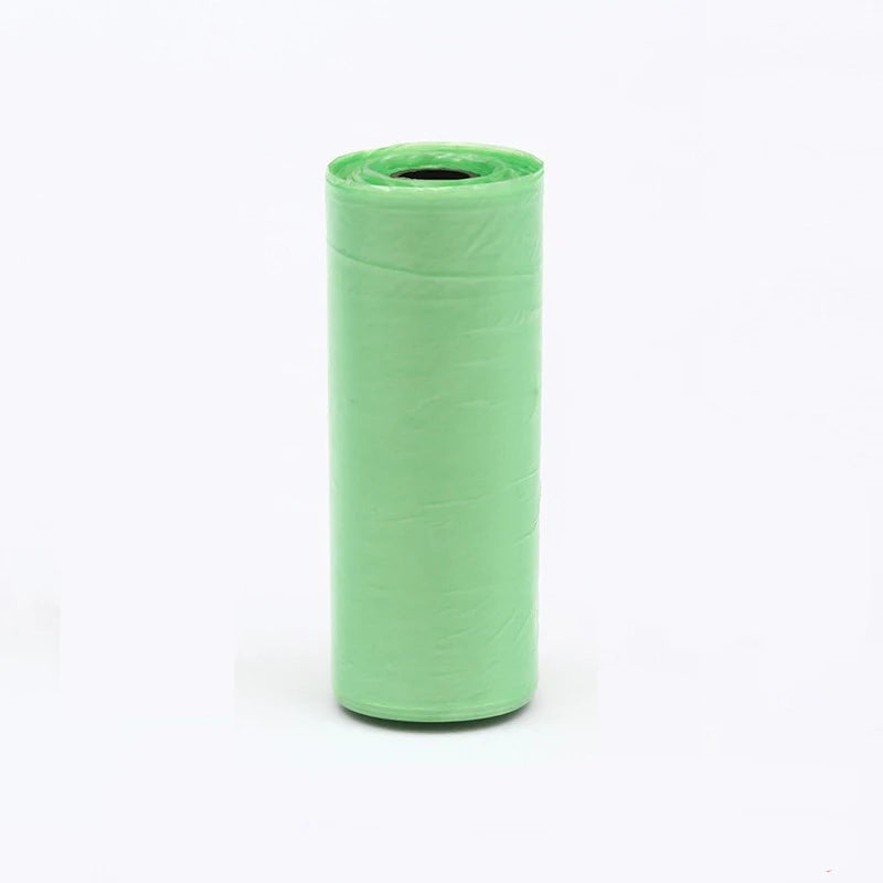A roll of multi-color continuous dog poop bags in a light green color.
