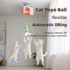 A white cat is being lifted by a pink automatic electric hanging toy called the Cat Yoyo Ball.