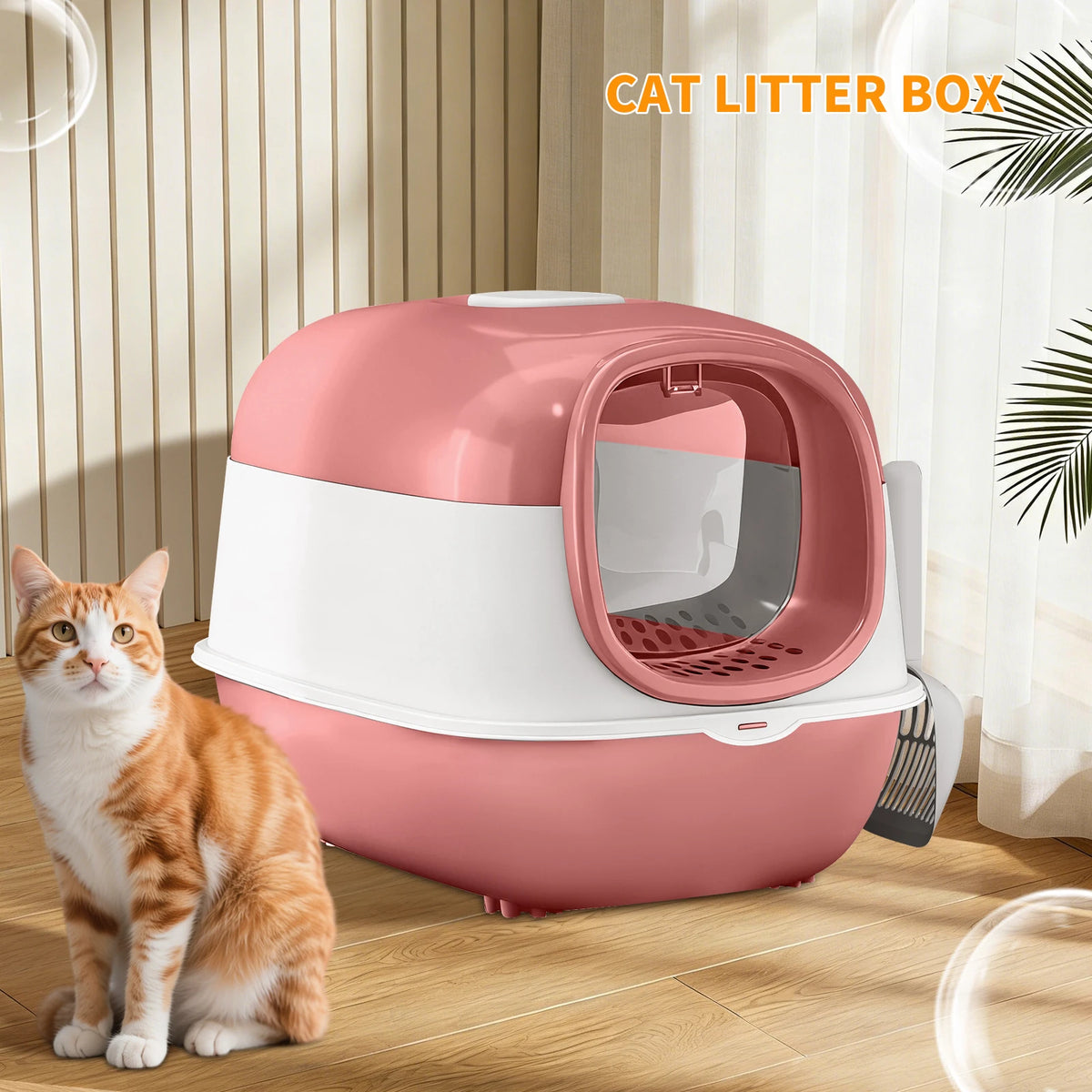 A pink and white enclosed cat litter box is shown with a cat sitting next to it.