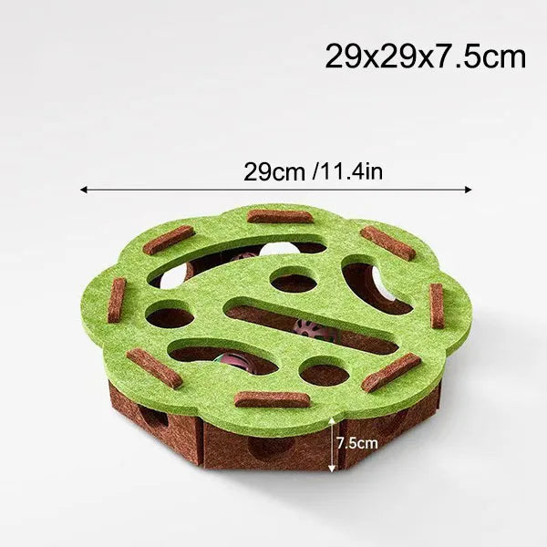A green puzzle toy box with a maze tunnel and holes for a ball, measuring 29x29x7.5cm.
