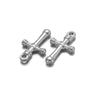 A pair of vintage silver cross charms used for DIY jewelry making.