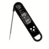 A black instant read digital meat thermometer with a backlit display and probe.