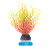 A vibrant, bushy aquatic plant with bright yellow and reddish-orange filaments planted in a dark pot.