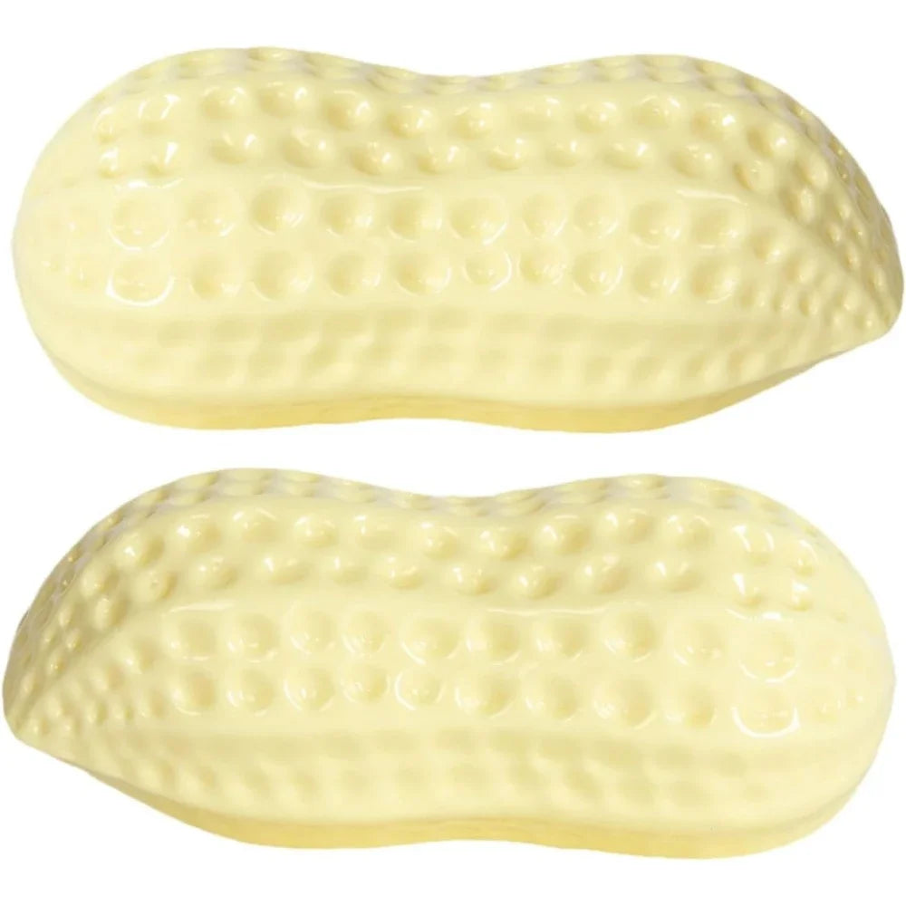 Two yellow peanut-shaped squeaky dog toys made of durable rubber for chewing and teeth cleaning