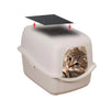 A white litter box with a removable lid and a black filter pad placed on top.