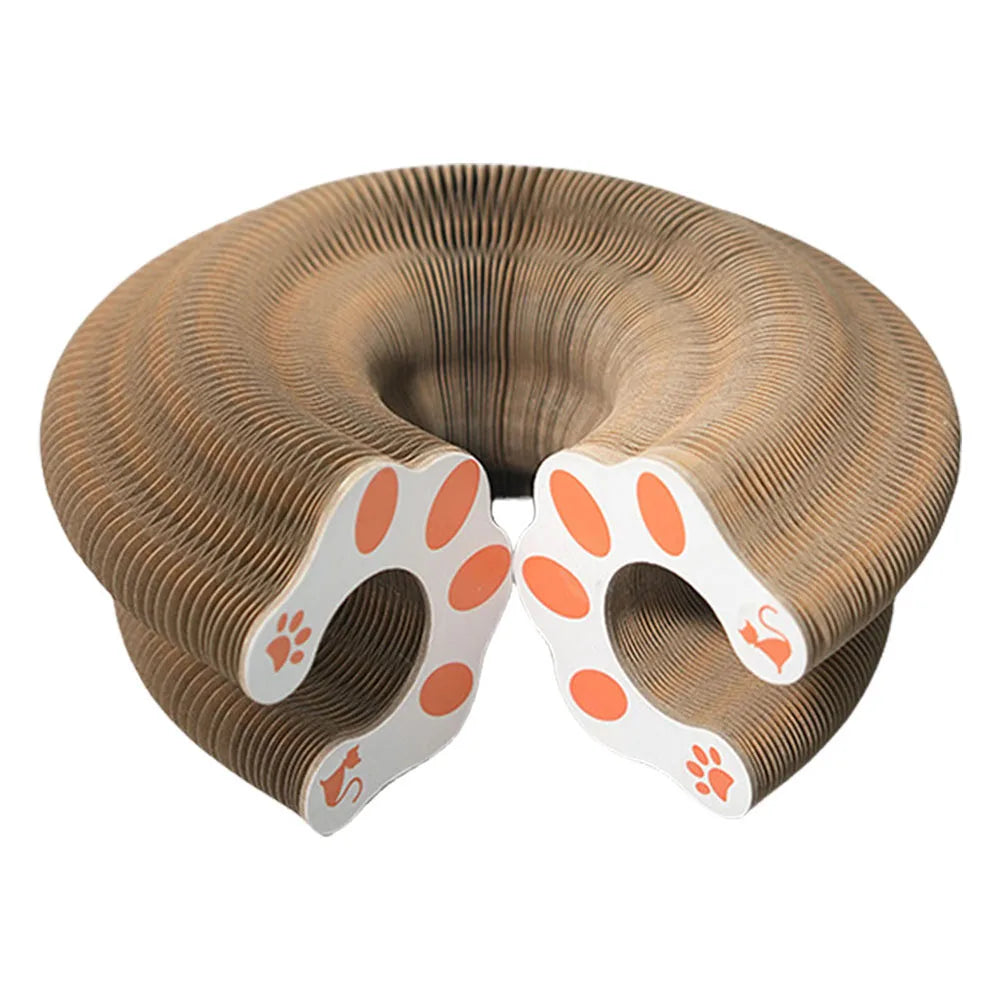 A brown accordion cat scratcher with white and orange paw print accents.